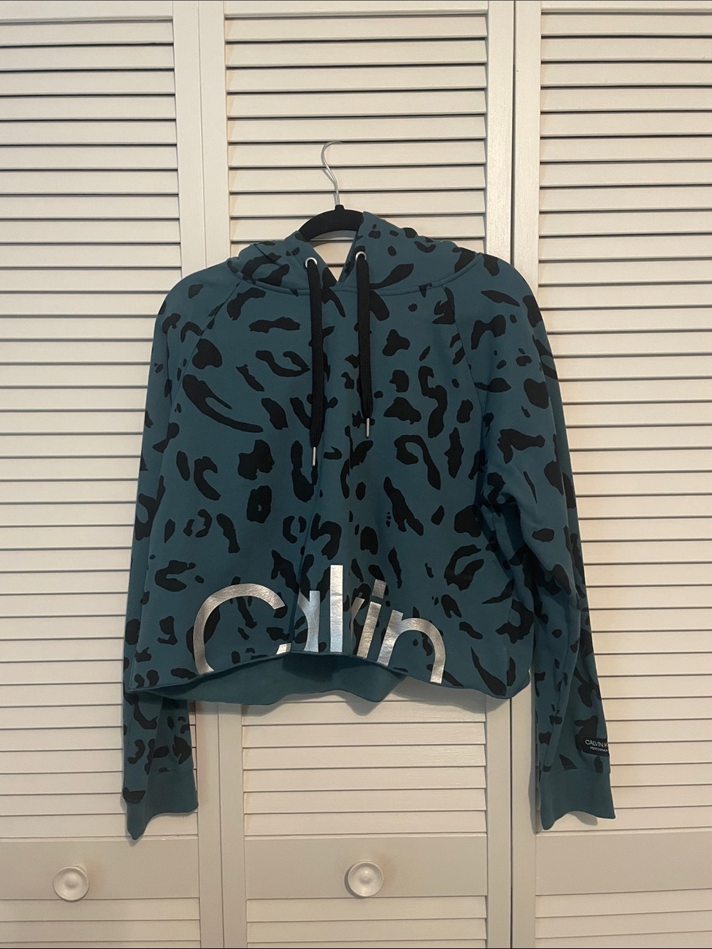 Calvin Klein Performance Teal Cropped Leopard Print Hoodie with Silver Logo